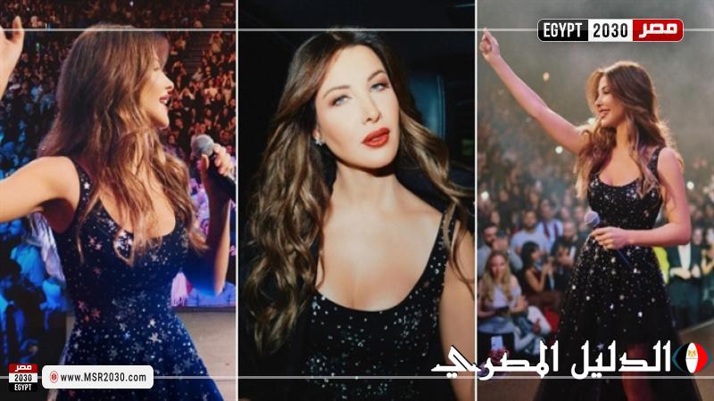 نانسي عجرم بفستان أسود من التول مزين بالنجوم في حفلها في باريس